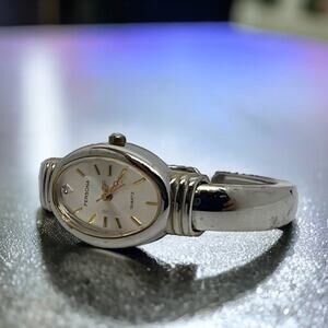 Persona Oval Silver Tone Bangle Watch Classic Gold Accents Quartz Movement